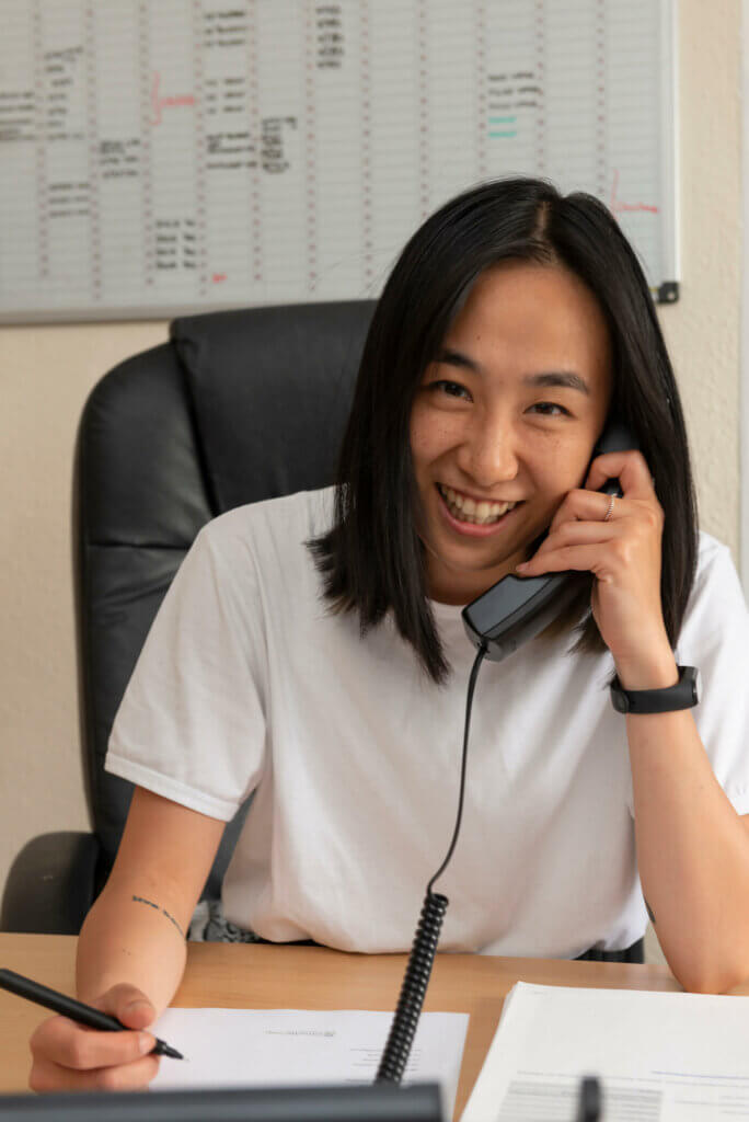 Office volunteer on phone