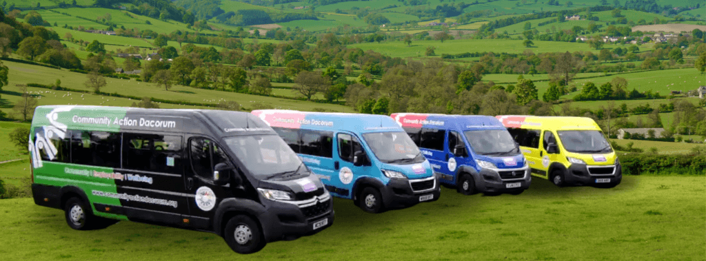 a row of newly coloured mini busses